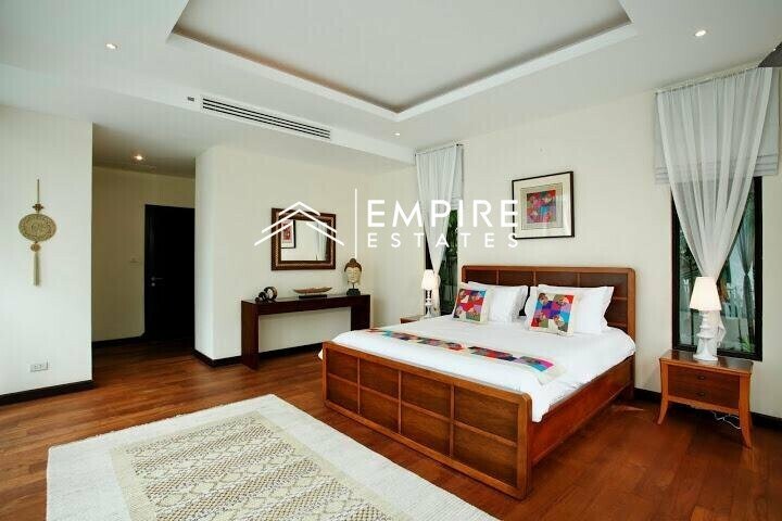 the bed in this modern bedroom is made of wood